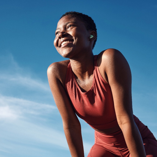 Lady smiles outdoors